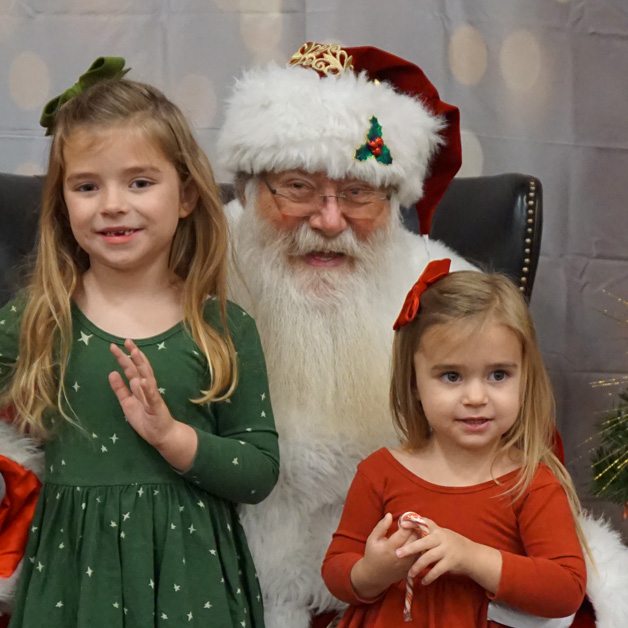 RSB Fundraisers Image of two little girls with santa